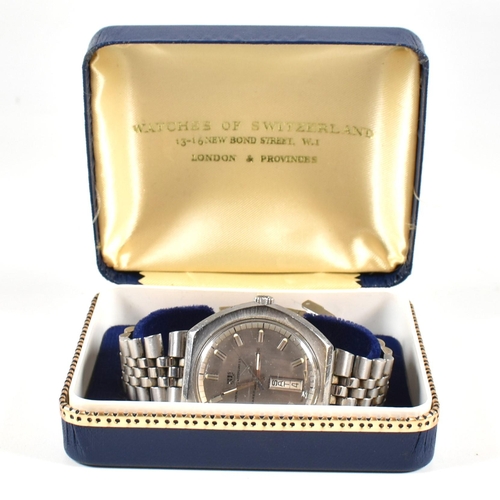 376 - A Watches of Switzerland Seafarer automatic wristwatch. The watch having a silvered dial with baton ... 