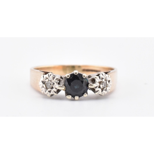 383 - A hallmarked 9ct gold, sapphire and diamond three-stone ring. The 9ct yellow gold ring set with a ce... 