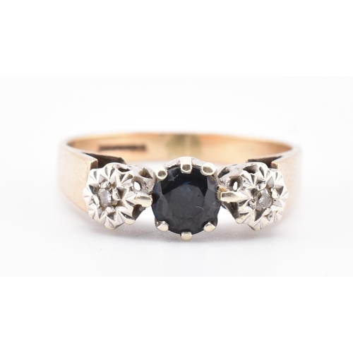 383 - A hallmarked 9ct gold, sapphire and diamond three-stone ring. The 9ct yellow gold ring set with a ce... 