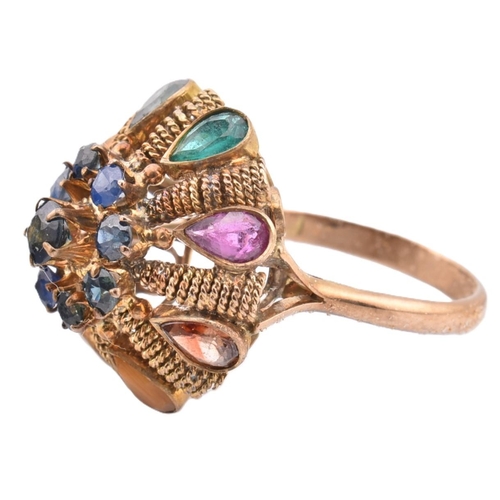 399 - A 14ct gold and multi-coloured gem princess cluster ring. The 14ct gold ring having a central round ... 