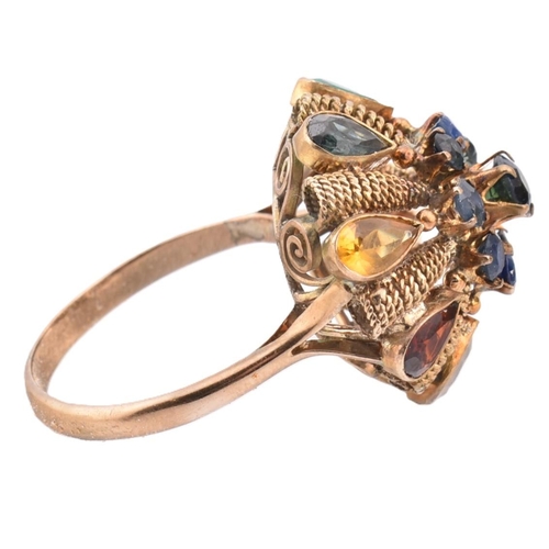 399 - A 14ct gold and multi-coloured gem princess cluster ring. The 14ct gold ring having a central round ... 