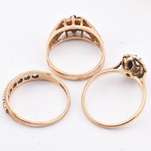 414 - Three hallmarked 9ct gold and gem set rings AF. The rings to include a 1970s hallmarked 9ct gold and... 