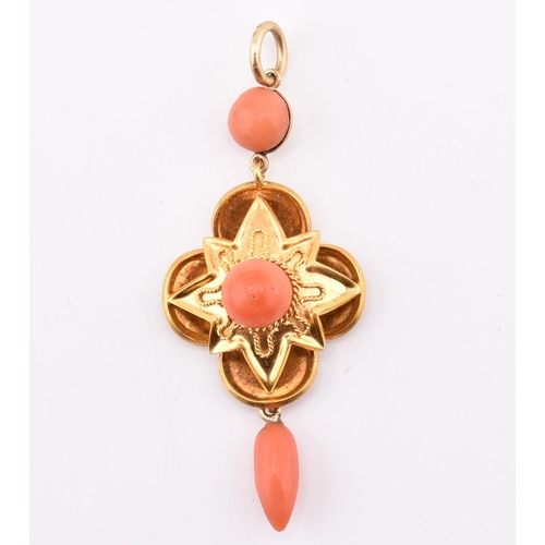 45 - A 15ct gold and coral locket pendant. The antique necklace pendant having a coral tassel surmounted ... 