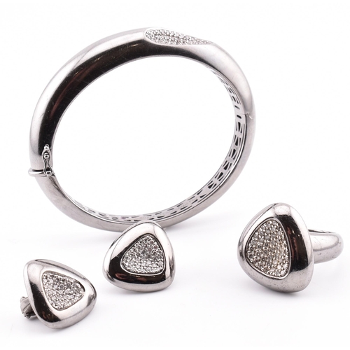 6 - A Roberto Coin Capri plus 925 silver and diamond set bangle, ring and earring suite. The jewellery t... 