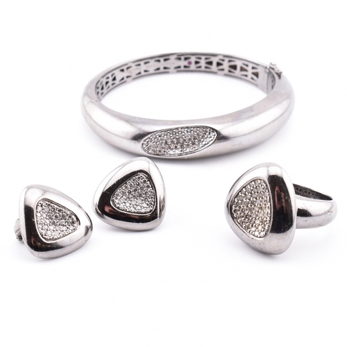 6 - A Roberto Coin Capri plus 925 silver and diamond set bangle, ring and earring suite. The jewellery t... 