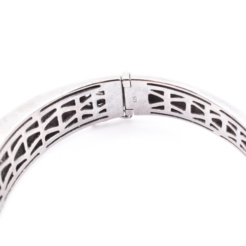 6 - A Roberto Coin Capri plus 925 silver and diamond set bangle, ring and earring suite. The jewellery t... 