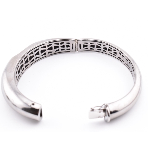 6 - A Roberto Coin Capri plus 925 silver and diamond set bangle, ring and earring suite. The jewellery t... 