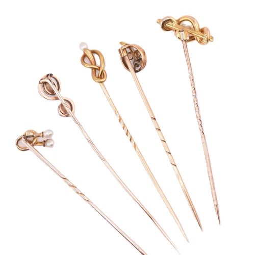 66 - A collection of 15ct gold and 9ct gold stick pins. The stick pins to include four 15ct gold and pear... 