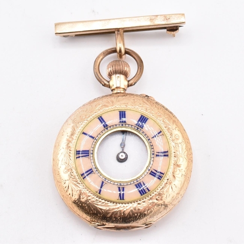 68 - An early 20th century 14ct gold half hunter fob watch. The watch with a foliate engraved outer case ... 