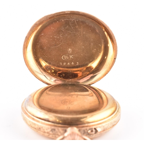 68 - An early 20th century 14ct gold half hunter fob watch. The watch with a foliate engraved outer case ... 