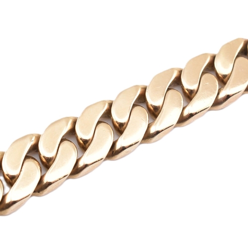 72 - A hallmarked 9ct gold curb link chain bracelet. The 9ct yellow gold curb link chain bracelet having ... 