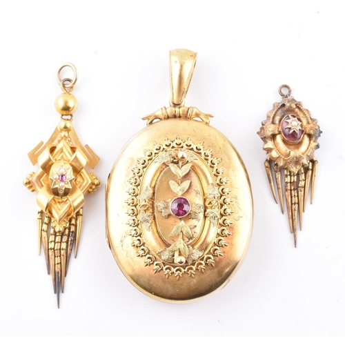 82 - Three 19th century gem set necklace pendants. The pendants to include locket decorated with ivy foli... 