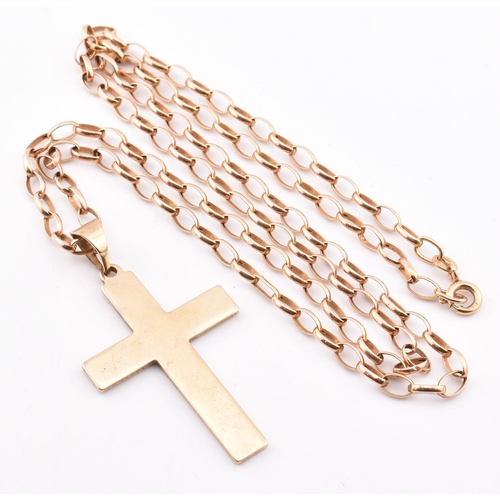 86 - A hallmarked 9ct gold chain necklace with cross pendant. The Italian hallmarked 9ct gold cable chain... 