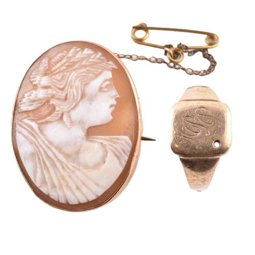 89 - A gold signet ring together with a carved shell cameo brooch pin marked 9ct.  The ring unmarked test... 