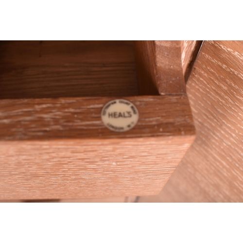 130 - Heals of London - a vintage 20th century 1930s Art Deco limed oak wardrobe. The wardrobe having two ... 