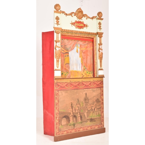 135 - A large early 20th century circa 1900 hand painted wooden Guignol puppet theatre. The theatre having... 