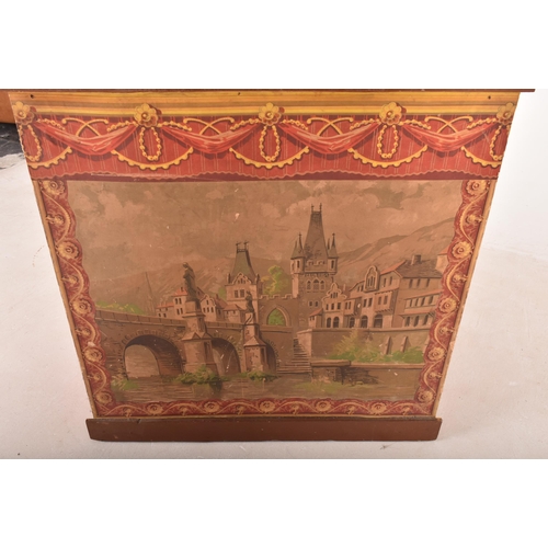 135 - A large early 20th century circa 1900 hand painted wooden Guignol puppet theatre. The theatre having... 