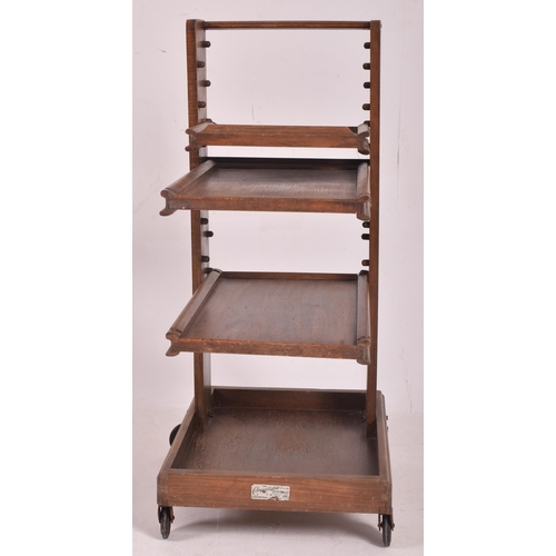 136 - Compactum Ltd. of London - ' Compactable ' - an Art Deco 20th century circa 1930s oak folding compac... 