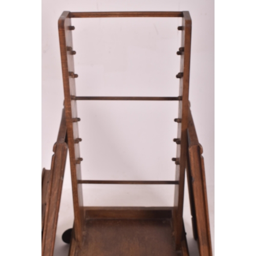 136 - Compactum Ltd. of London - ' Compactable ' - an Art Deco 20th century circa 1930s oak folding compac... 