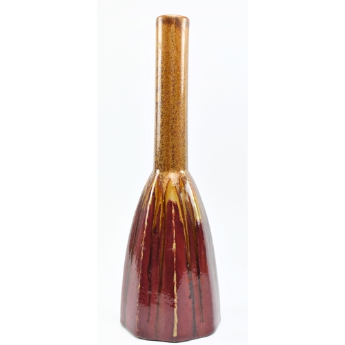 138 - A vintage 20th century brutalist West German style studio art vase. The vase with long cylindrical n... 