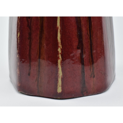 138 - A vintage 20th century brutalist West German style studio art vase. The vase with long cylindrical n... 