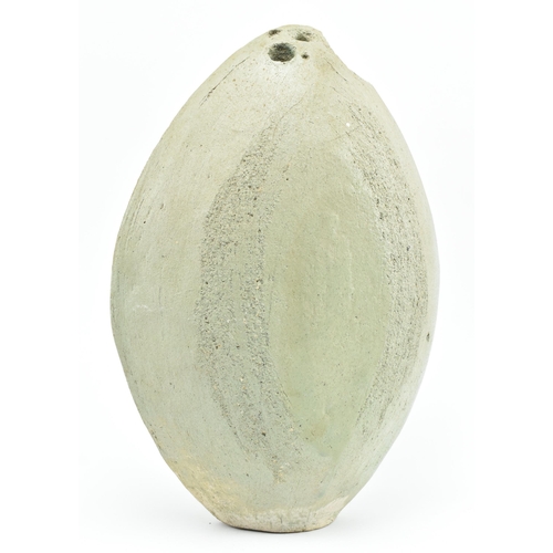 142 - A retro mid 20th century studio art pottery Brutalist style coconut vase. The vase of ovoid shape wi... 