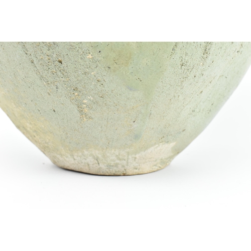 142 - A retro mid 20th century studio art pottery Brutalist style coconut vase. The vase of ovoid shape wi... 