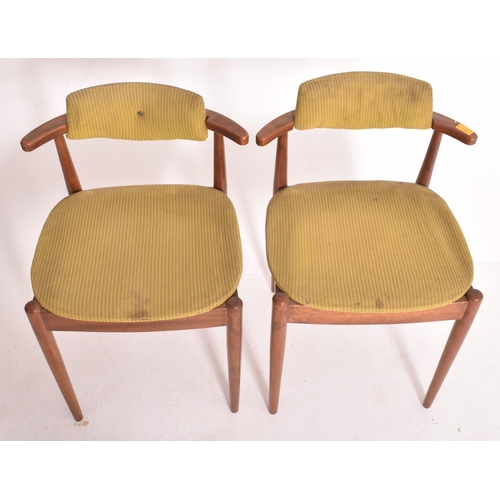 145 - A matching set of four retro 20th century Danish teak framed dining chairs. Each chair having black ... 