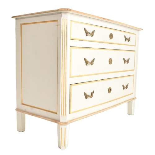 147 - A contemporary French-inspired oak-painted chest of drawers. The chest having a having a canted stri... 