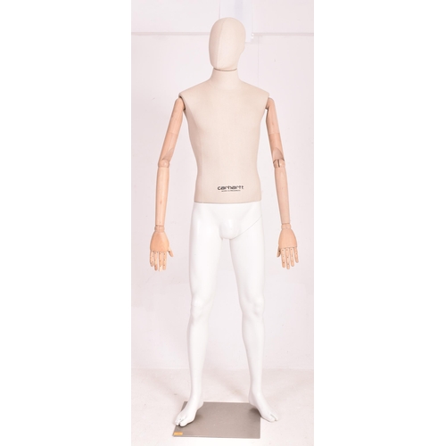 149 - Carhartt Clothing - a modern, full-bodied shop display articulated male mannequin. The mannequin hav... 