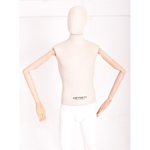 149 - Carhartt Clothing - a modern, full-bodied shop display articulated male mannequin. The mannequin hav... 