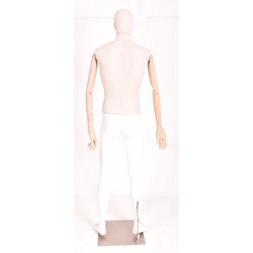 149 - Carhartt Clothing - a modern, full-bodied shop display articulated male mannequin. The mannequin hav... 