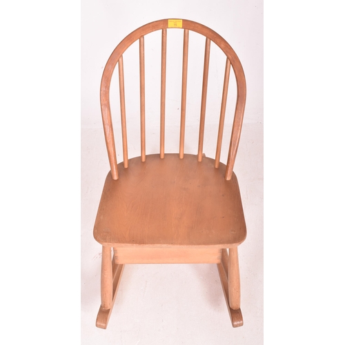 15 - Lucien Ercolani for Ercol Furniture - Model 325 - A retro mid 20th century circa 1960s beech and elm... 