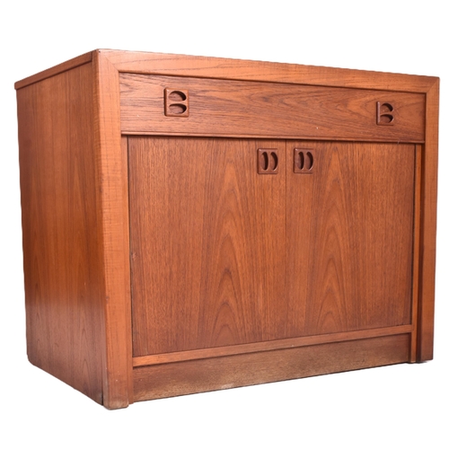 150 - A retro 20th century Danish designed teak metomorphic cupboard / dining table or desk believed to be... 