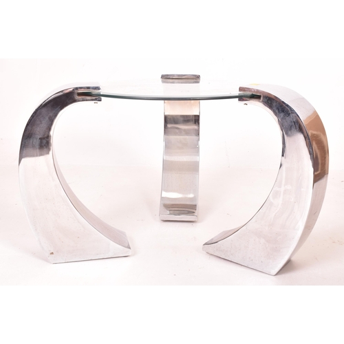 152 - Manner of Karl Springer - a contemporary designer coffee table / low table. The table having a circu... 