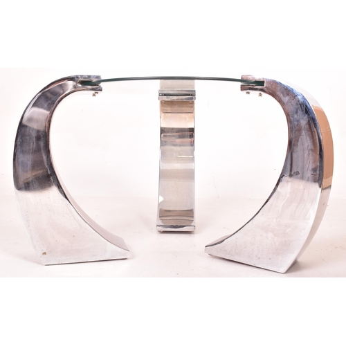 152 - Manner of Karl Springer - a contemporary designer coffee table / low table. The table having a circu... 