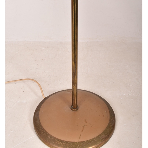 153 - A retro 1970s Boho floorstanding / standard lamp light. The lamp having twin gooseneck brass arms su... 