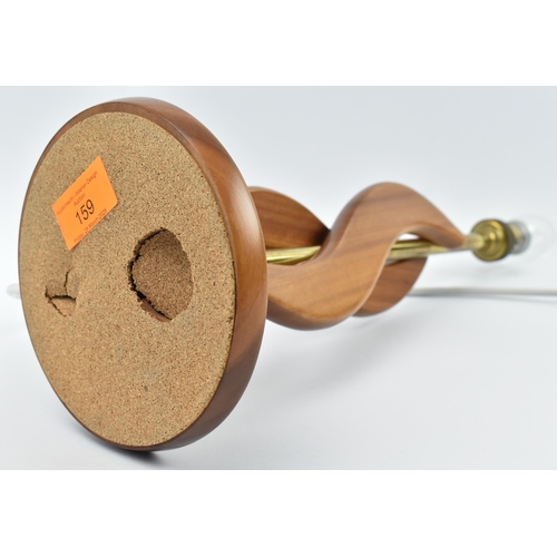 159 - British Modern Design - a mid 20th century circa 1960s atomic teak table lamp. The lamp having doubl... 