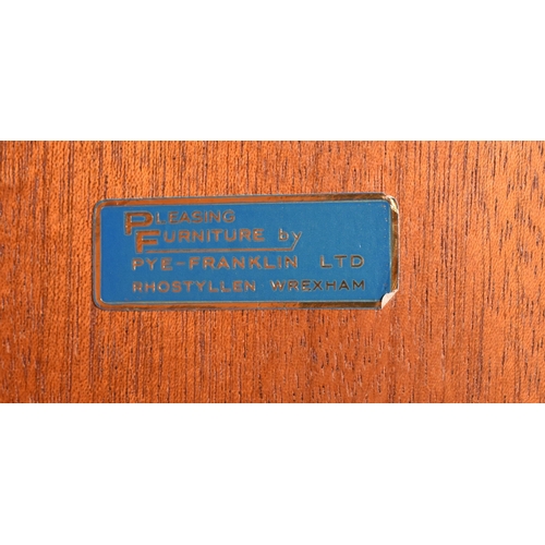 16 - A retro mid 20th century 1960s teak Hi-Fi record cabinet. The cabinet having twin doors opening to r... 