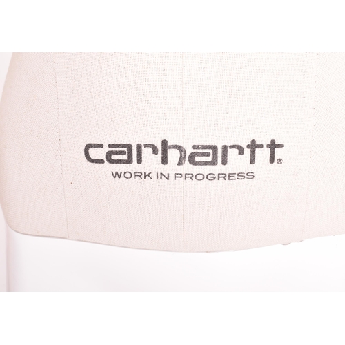 162 - Carhartt Clothing - a modern, full-bodied shop display articulated female mannequin. The mannequin h... 