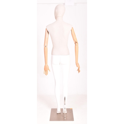 162 - Carhartt Clothing - a modern, full-bodied shop display articulated female mannequin. The mannequin h... 