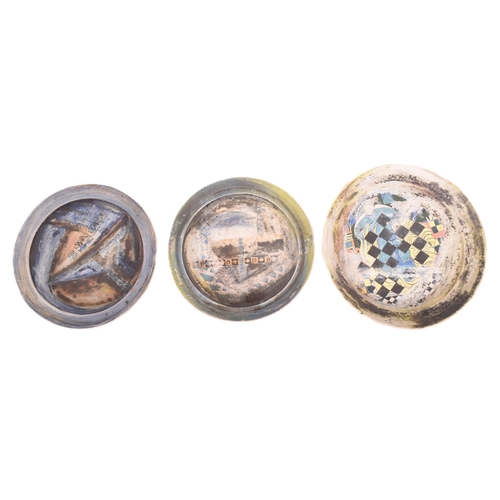 166 - A selection of 20th century studio art pottery charger plates. Each charger being hand-painted and m... 