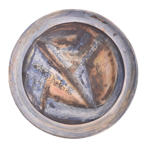 166 - A selection of 20th century studio art pottery charger plates. Each charger being hand-painted and m... 