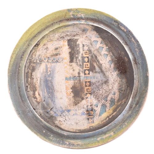 166 - A selection of 20th century studio art pottery charger plates. Each charger being hand-painted and m... 
