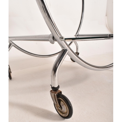 168 - A vintage 20th century Art Deco style two tier cocktail drinks trolley. The circular chrome frame su... 