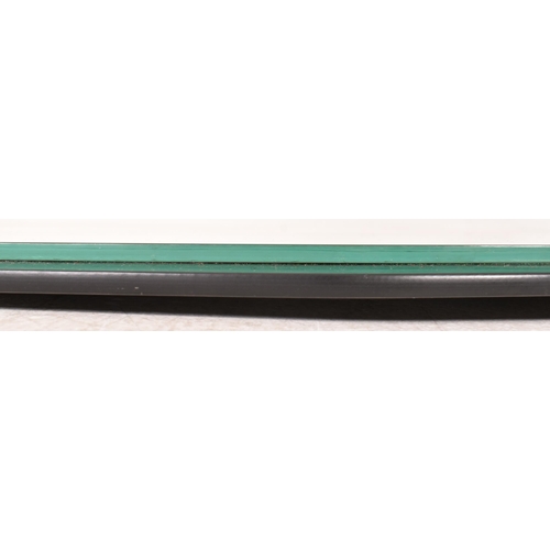 17 - A vintage 20th century Art Deco black glass framed hanging mirror. The mirror having a shaped mirror... 