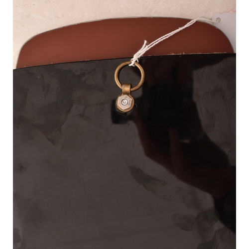 17 - A vintage 20th century Art Deco black glass framed hanging mirror. The mirror having a shaped mirror... 