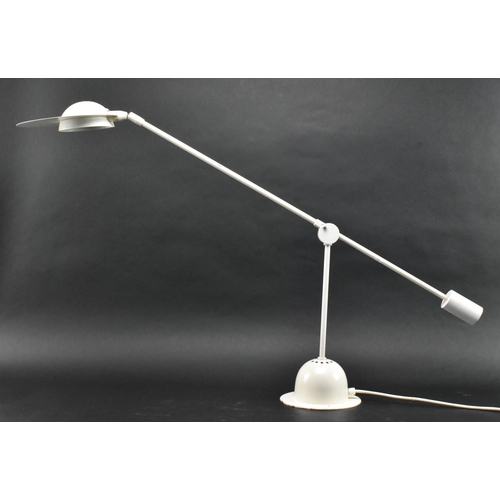 173 - A retro mid 20th century white enamel metal counterweight desk table lamp light. The lamp having a d... 