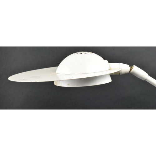 173 - A retro mid 20th century white enamel metal counterweight desk table lamp light. The lamp having a d... 