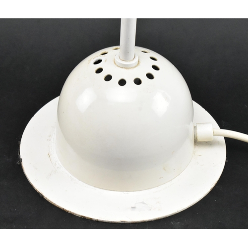 173 - A retro mid 20th century white enamel metal counterweight desk table lamp light. The lamp having a d... 